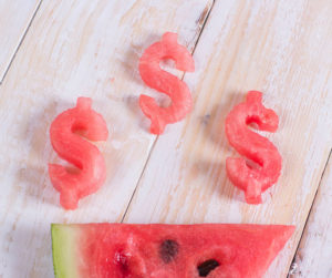 Watermelon Cut out to Look Like Dollar Signs