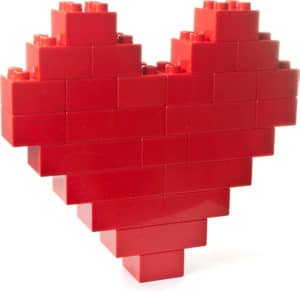 Red heart made of Lego blocks