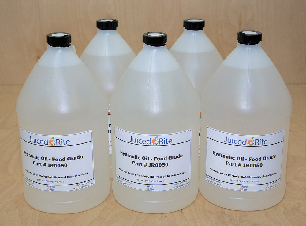 Photo of five one-gallon jugs of Food Grade Hydraulic Oil labeled with Juiced Rite branding.